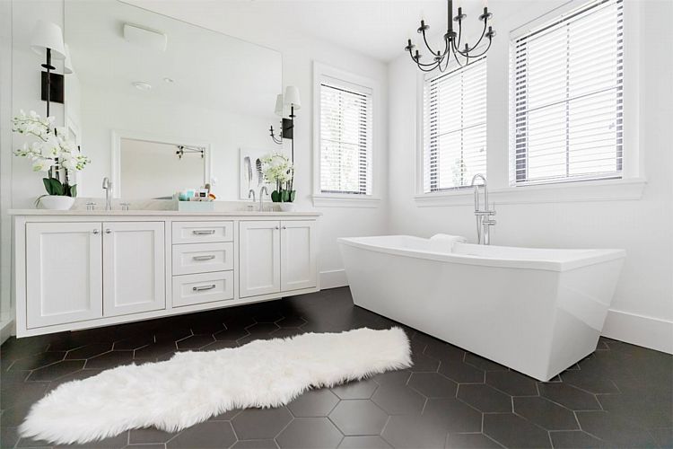 The Primary Bath in a Crafty Farmhouse with Four Grouped Bedrooms Upstairs