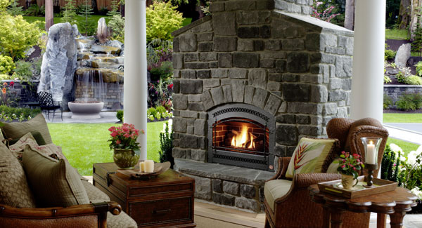outdoor fireplace on covered porch