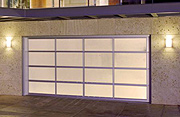 A Striking Modern Aluminum and Glass Garage Door Designed for Light with Privacy
