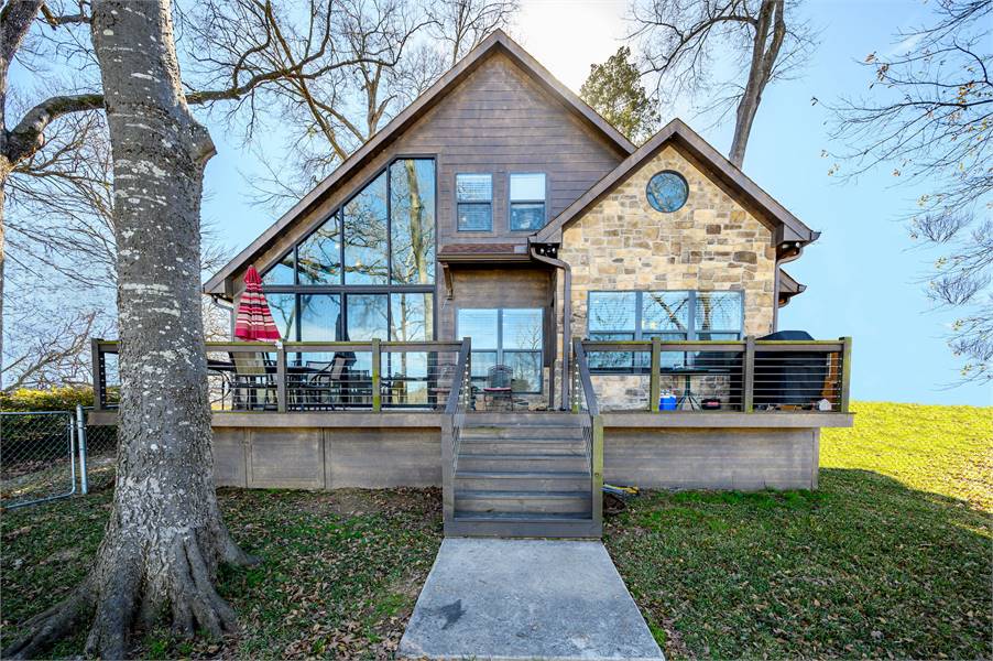 a bright cottage with huge windows