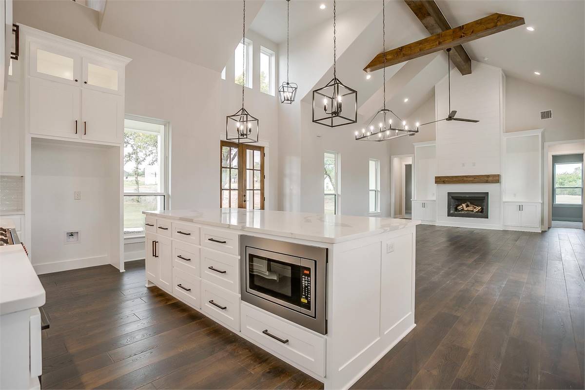 a stunning cathedral great room in one of our modern farmhouse plans