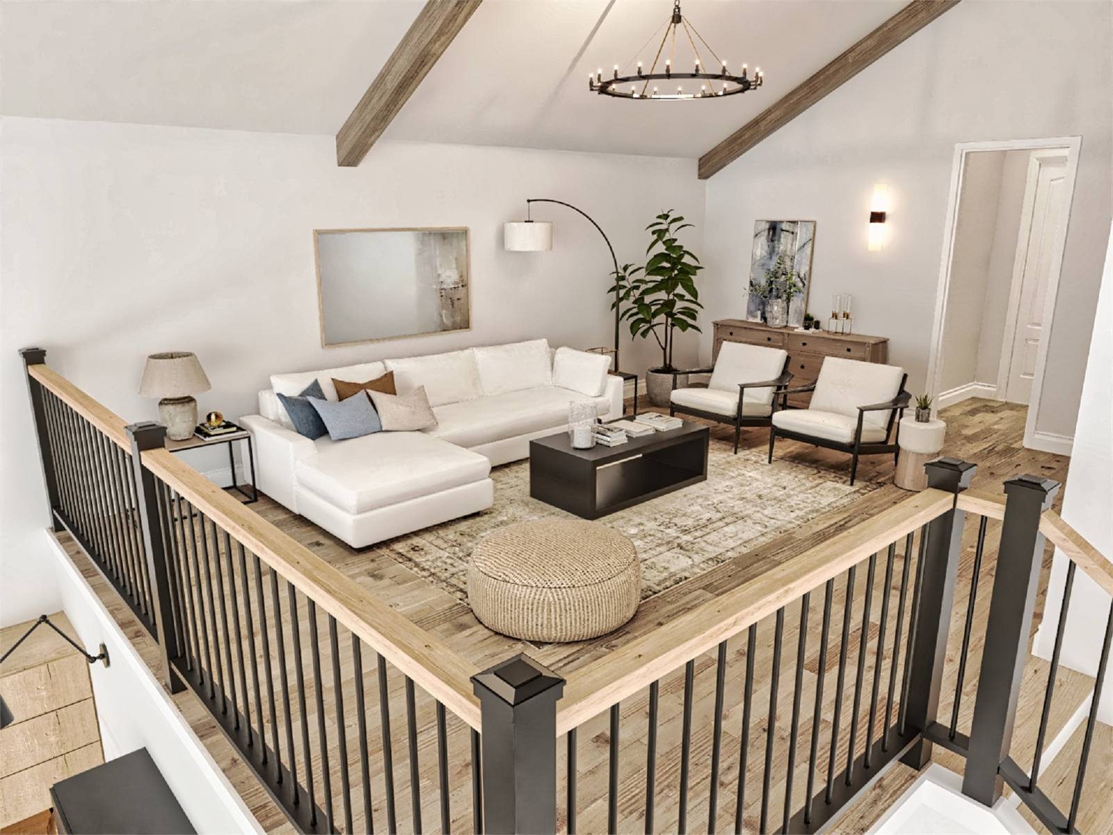 the loft area overlooking the open living areas in a barndominium