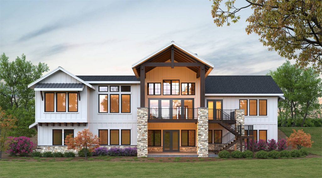 the rear of a mountain-style modern farmhouse with outdoor living