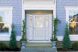 A Lovely, Bright White Door with Impact Rated Decorative Glass to Withstand Coastal Storms