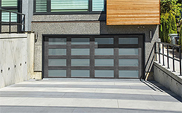 A Sleek Modern Door with Plenty of Windows on a Drive-Under Home