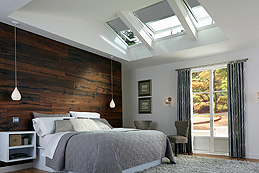 A Bedroom with Skylights with Blackout Blinds to Keep the Sun Out When You Want to Sleep In