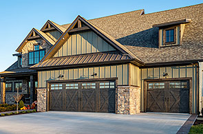 Wood-Look Garage Doors in a Carriage House Style on a Craftsman Home