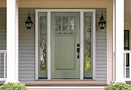 A Front Door with Top Divided Lites in a Cool Green Color