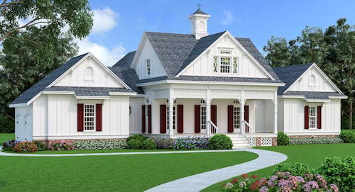 A Southern Farmhouse with Split Bedrooms, Two-Story Volume, and a Formal Kitchen and Dining