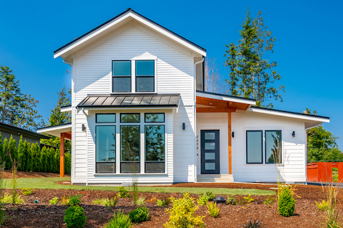 A Contemporary Two-Story Farmhouse with a Main-Level Master and a Rear Side-Entry Garage