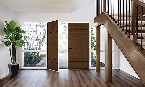 A Foyer in a Modern Home with a Double Door Entry with Asymmetrical Lines
