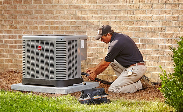 A Technician Installing a Heat Pump