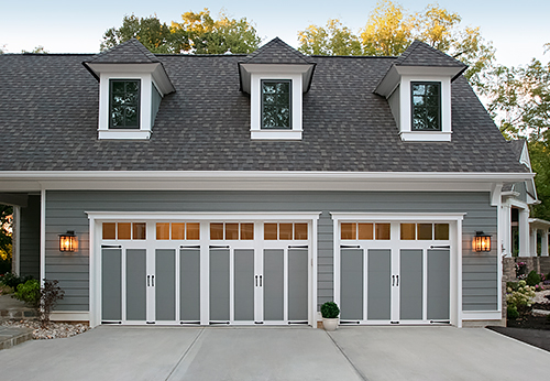 Two-Tone Carriage House Garage Doors in Blue/Grey and White