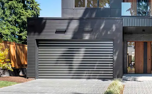 A Modern Wood-Look Garage Door with Chic Aluminum Inlays