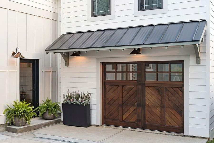 A Real Wood Carriage House Garage Door with Lites and a Chevron Base