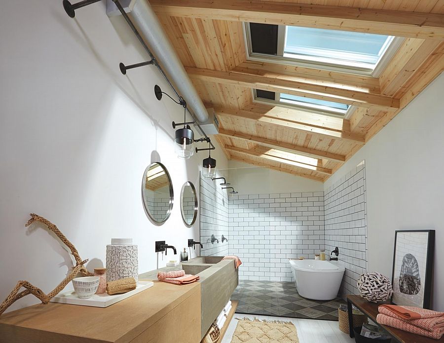 A Bathroom with Three Venting Skylights with Shades Overhead