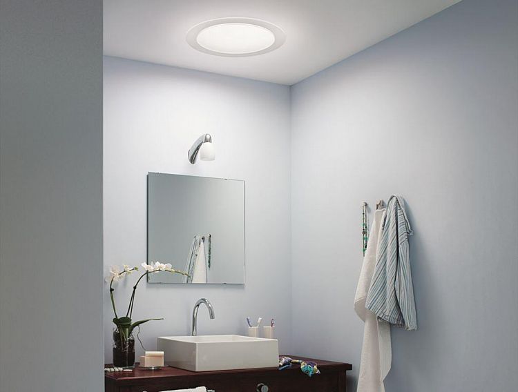 A Small Bathroom Brightened by a Sun Tunnel Skylight