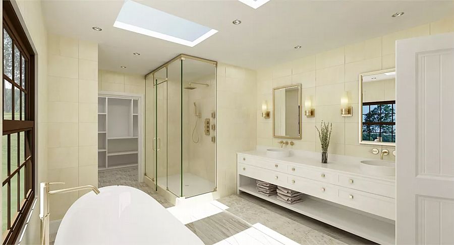 The Master Bath in a Luxury Traditional Home with Skylights Across the Suite