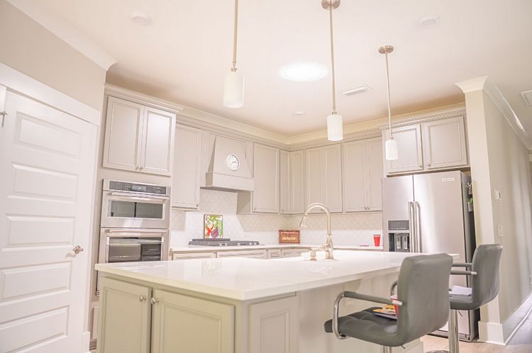 A Kitchen Brightened by a Single Sun Tunnel Skylight