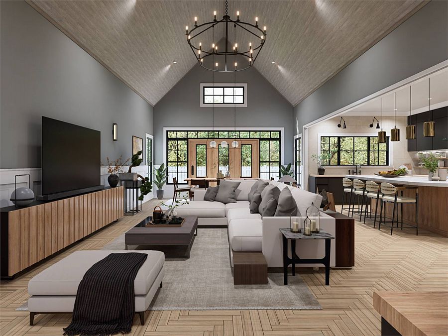 The Cathedral Living and Dining Spaces Beside an Island Kitchen in a 3-Bedroom Country Ranch