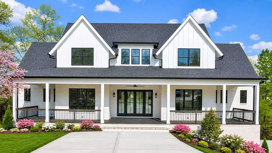 A Grand Modern Farmhouse with White Siding and Chic Black-Framed Windows