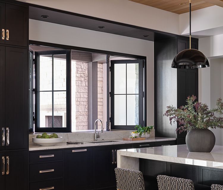 A Kitchen with a Pass-Through Bifold Window to Connect to Outdoor Living