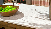 A Light Countertop with Brown and Gray Flecks for a Warmer Look