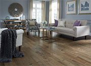 This Charming Living Room Looks Fantastic with a Neutral Distressed Floor