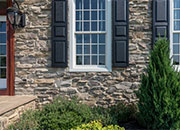 Stone Veneer Siding with Rough, Historical Character