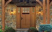 A Fiberglass Door with Handcrafted Wood Looks and a Dentil Shelf for Craftsman Charm
